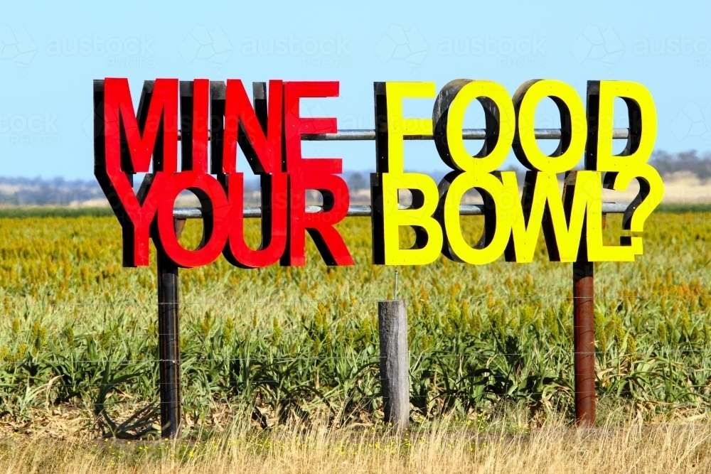 Protest sign in farm paddock - Mine your food bowl? - Australian Stock Image