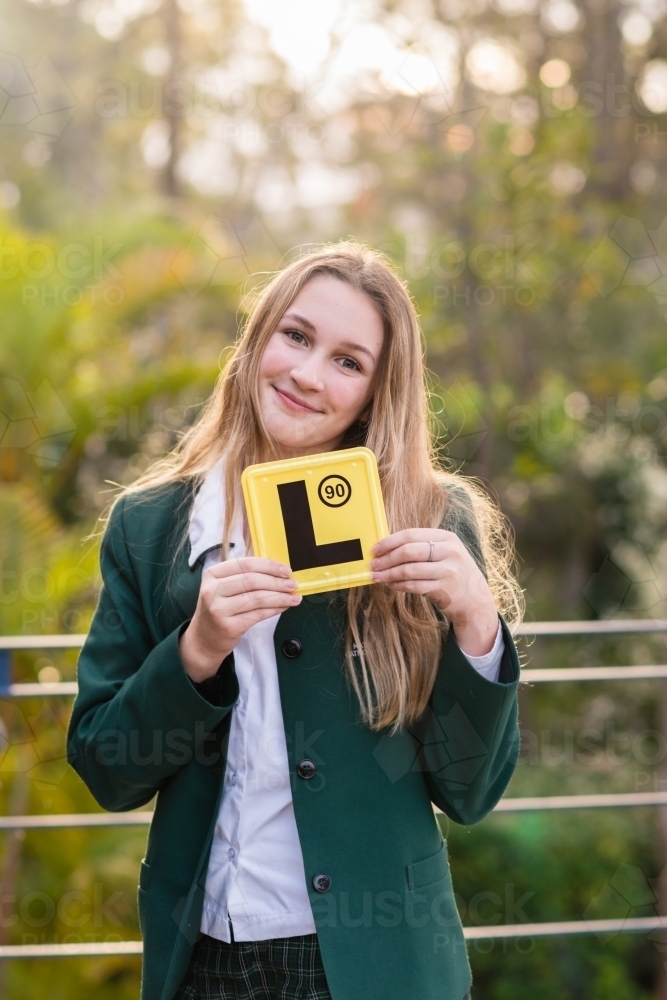 proud teenager with her L-plate - Australian Stock Image