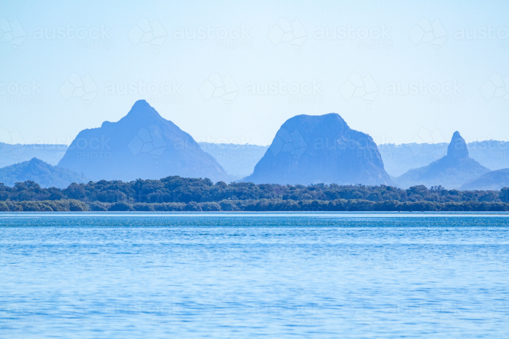 Pumicestone Passage, with the Glass House Mountains in the background. - Australian Stock Image