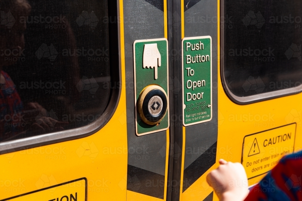 Image of push button to open train door - Austockphoto