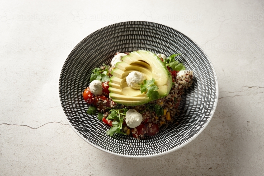 Quinoa bowl dish on table - Australian Stock Image