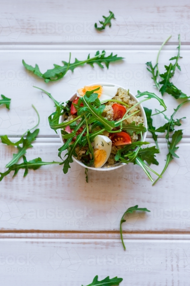 quinoa salad with chicken, egg, rocket and mustard - Australian Stock Image