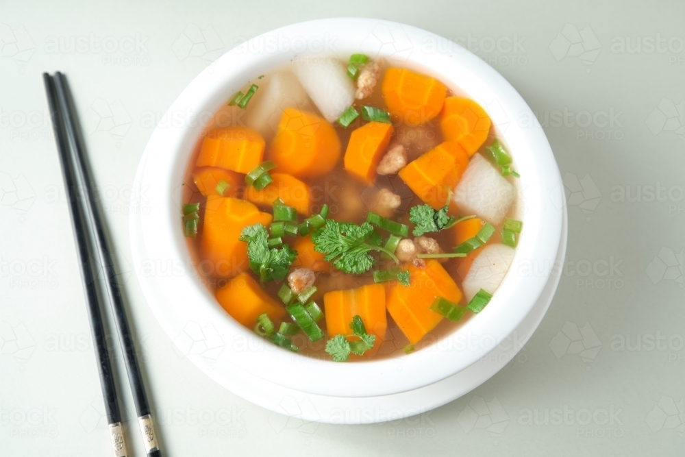 Radish pork crispy carrot soup - Australian Stock Image