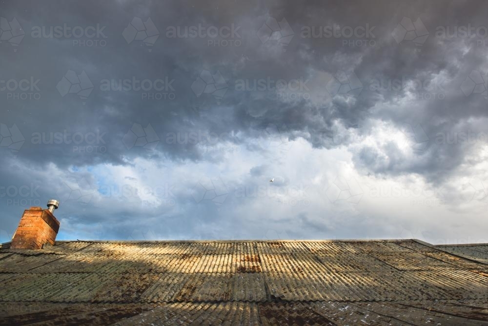 Rain on an old tin roof - Australian Stock Image
