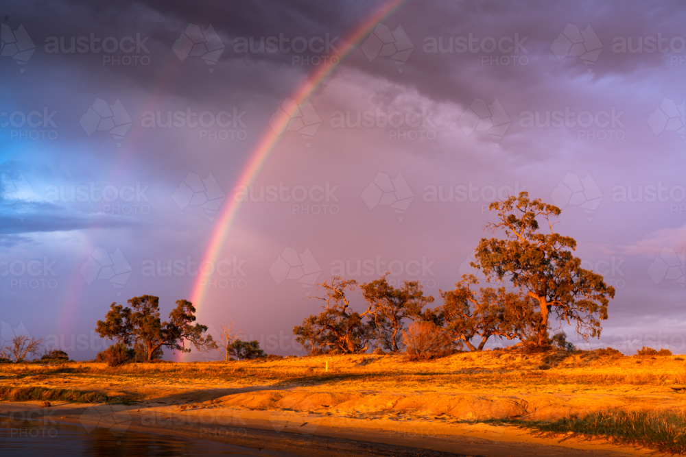 Rainbow at Lake Bonney, South Australia - Australian Stock Image