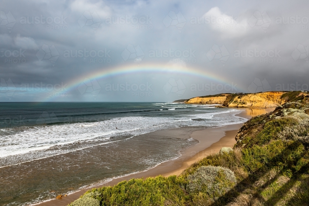 Rainbow over the sea - Australian Stock Image