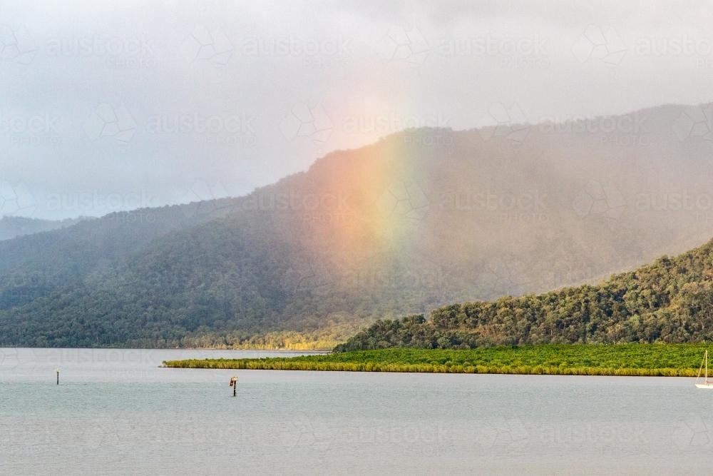 Rainbow over Trinity Inlet - Australian Stock Image