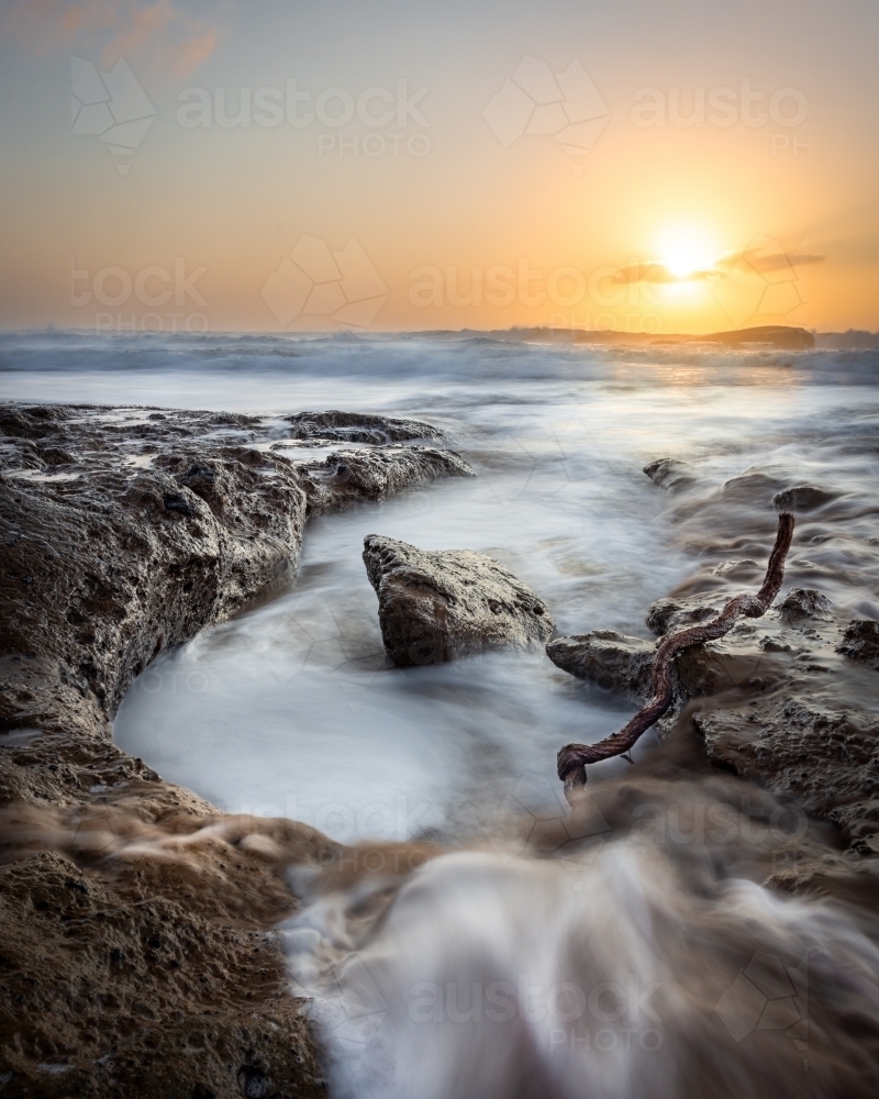 Receding Tidal Pools at Sunrise - Australian Stock Image
