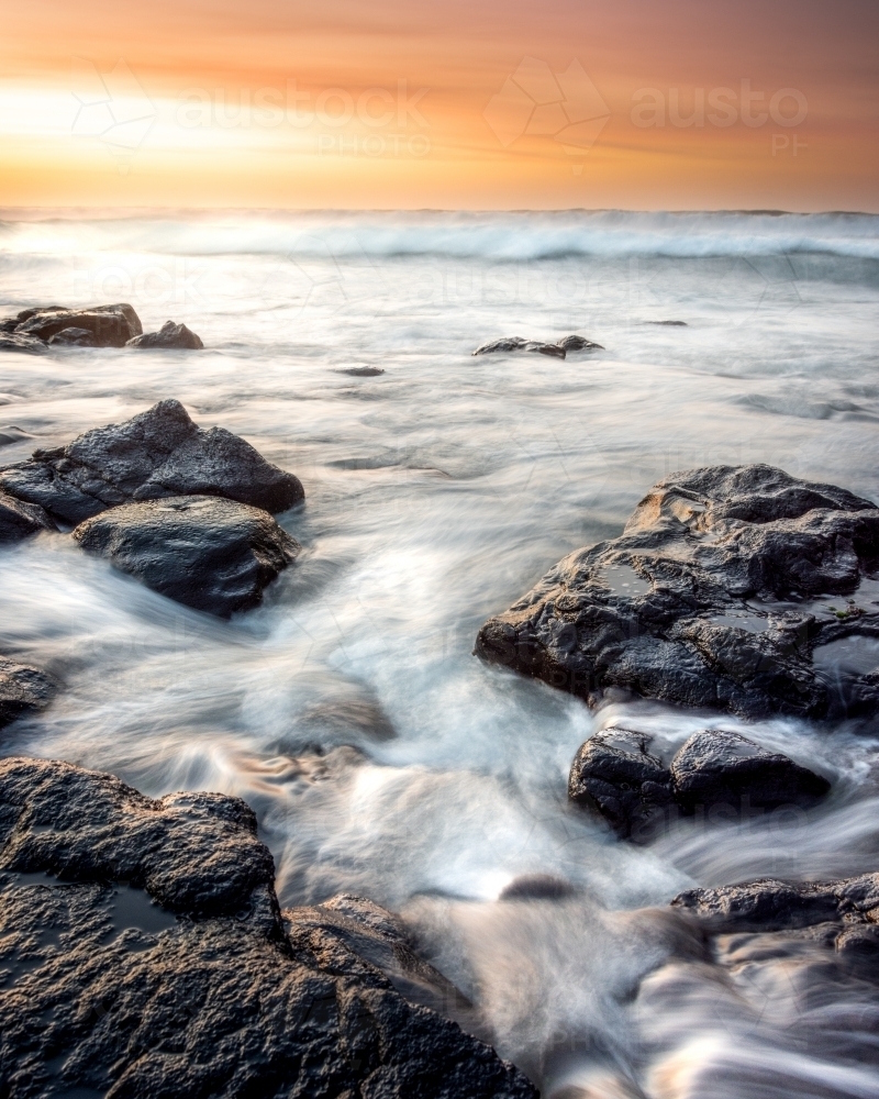 Receding Tidal Pools at Sunrise - Australian Stock Image