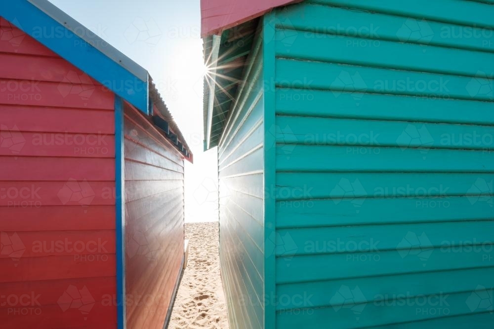 Red and Green Bathing Boxes from Behind - Australian Stock Image