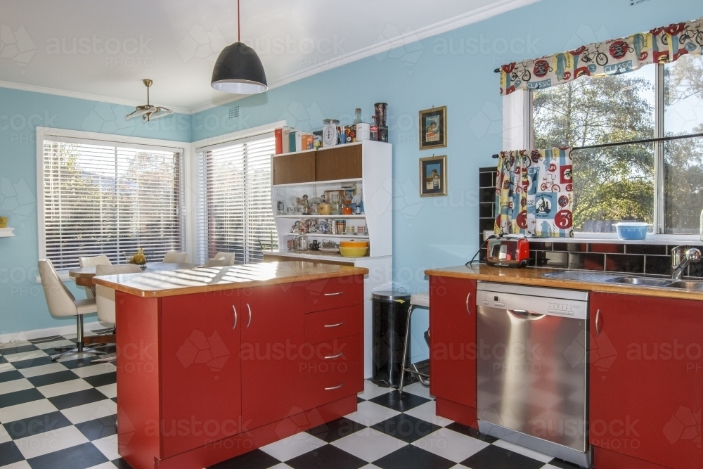 Image of Red and teal retro kitchen interior Austockphoto