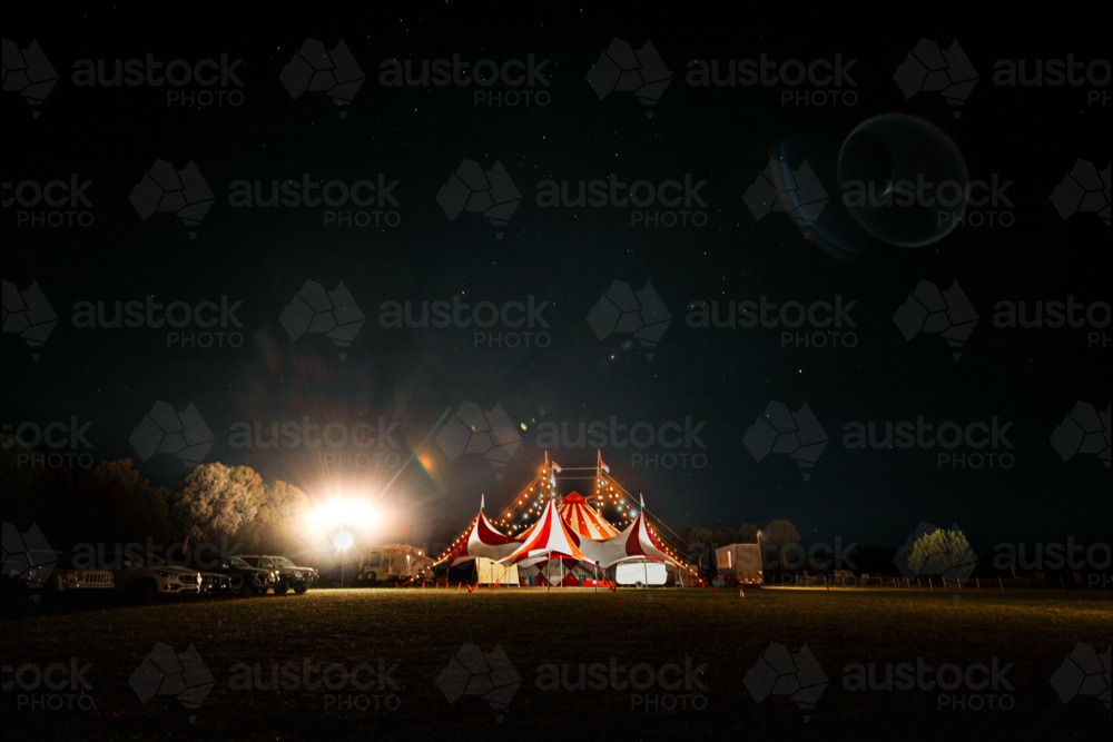 Image of Red and white big top circus tent visiting small town in rural ...
