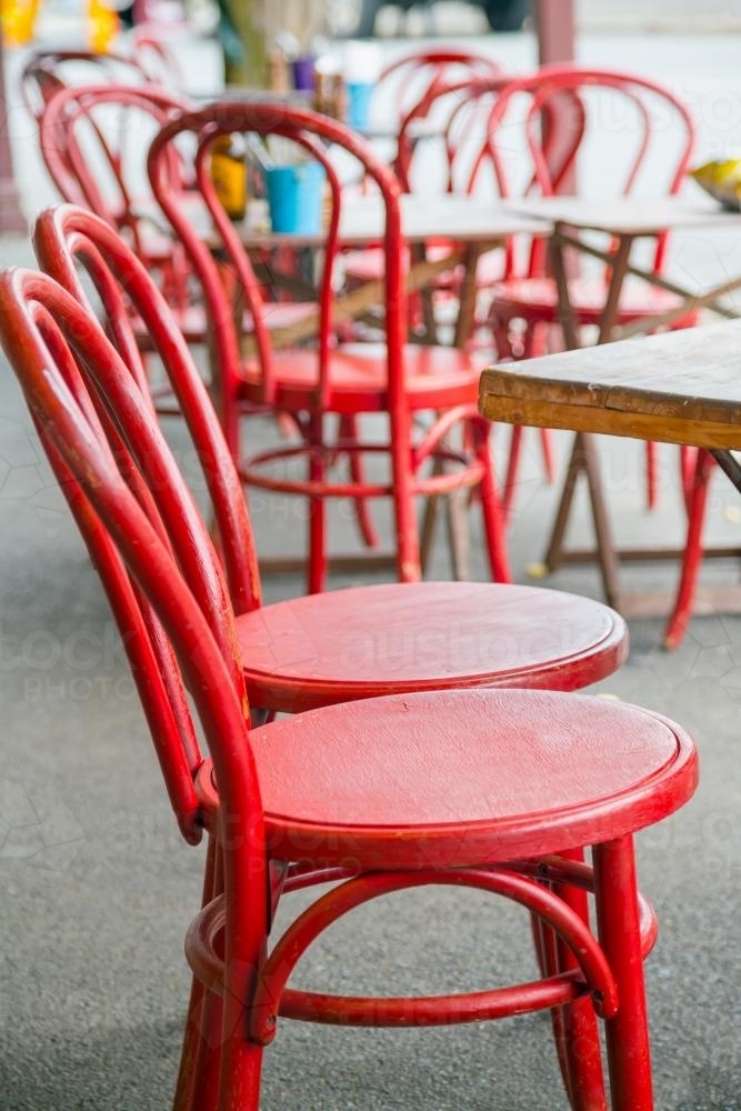 Red chairs outside a cafe - Australian Stock Image