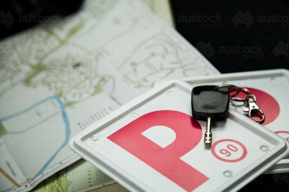Red P plates and keys on back seat of car - Australian Stock Image
