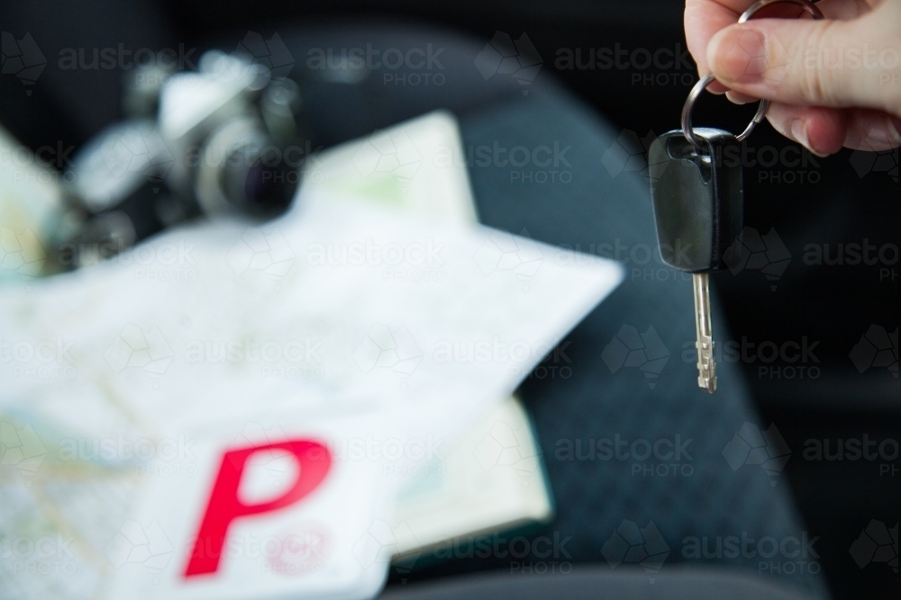 Red P plates and keys on back seat of car - Australian Stock Image