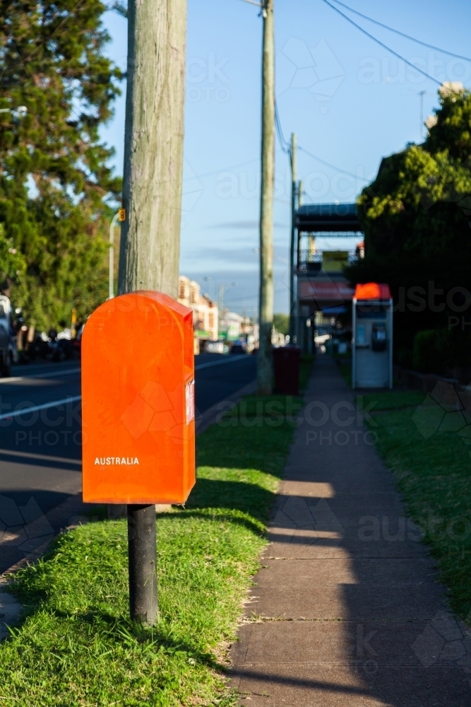 Red post box on Australian street - Australian Stock Image