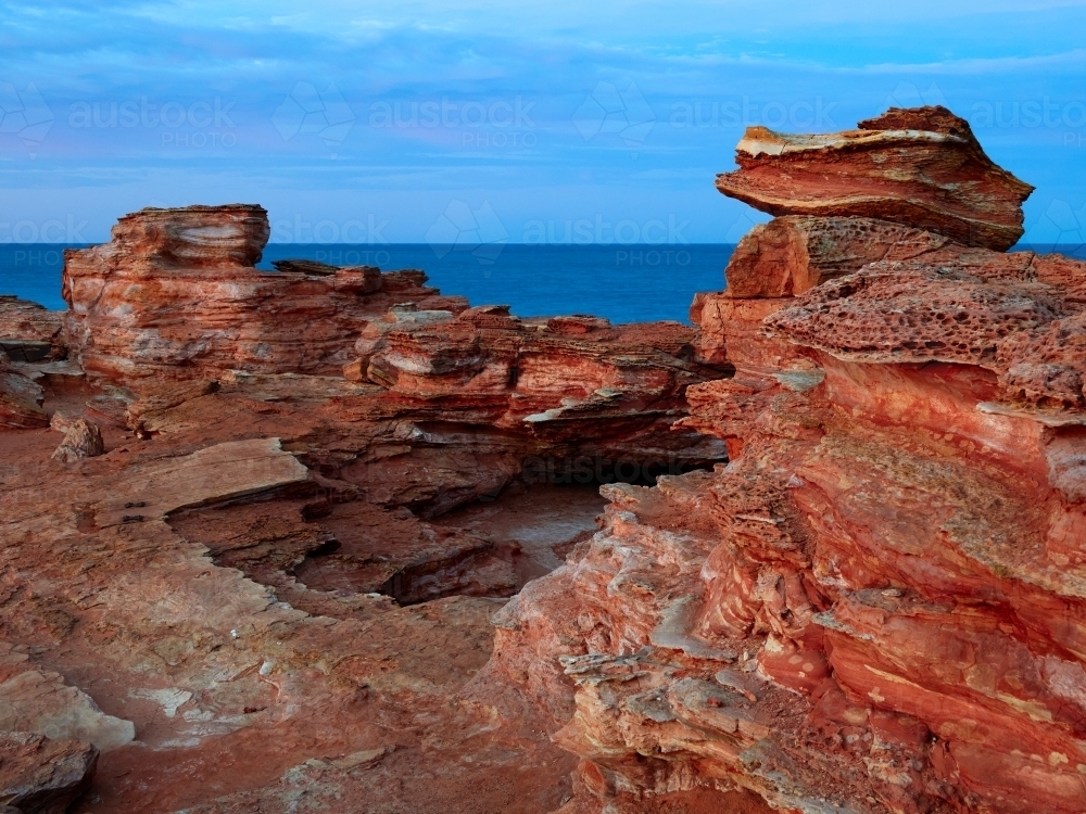 Red Rocks at Gantheaume Point in Broome - Australian Stock Image