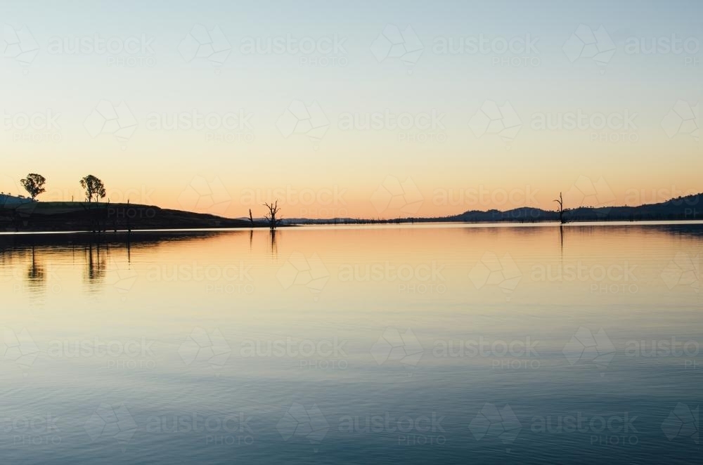Reflection in lake at sunset - Australian Stock Image
