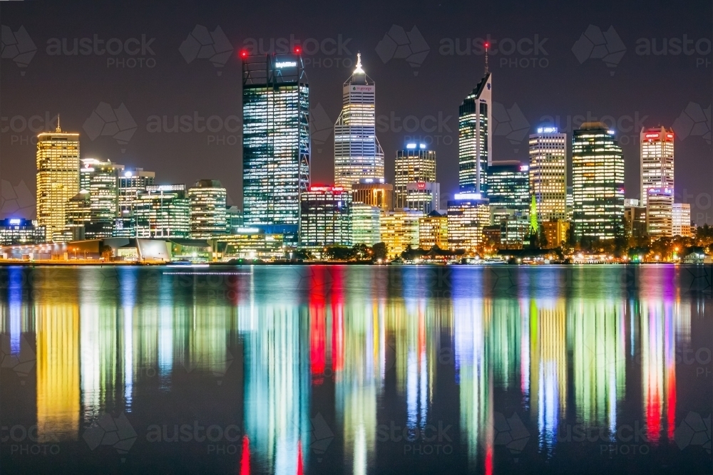 Reflection of the Perth's city lights looking across the Swan River - Australian Stock Image