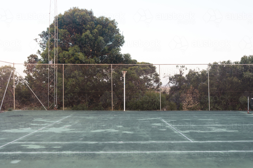 Regional Australia netball court surrounded by scrub - Australian Stock Image