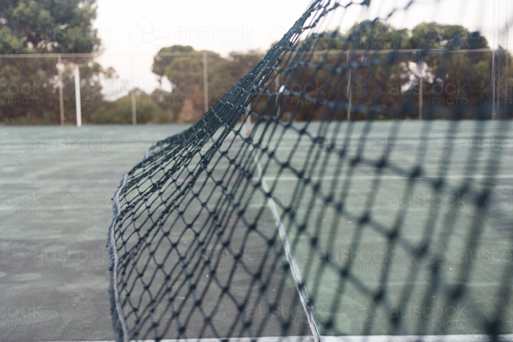 Regional Australia sport court containing netball and tennis facilities - Australian Stock Image