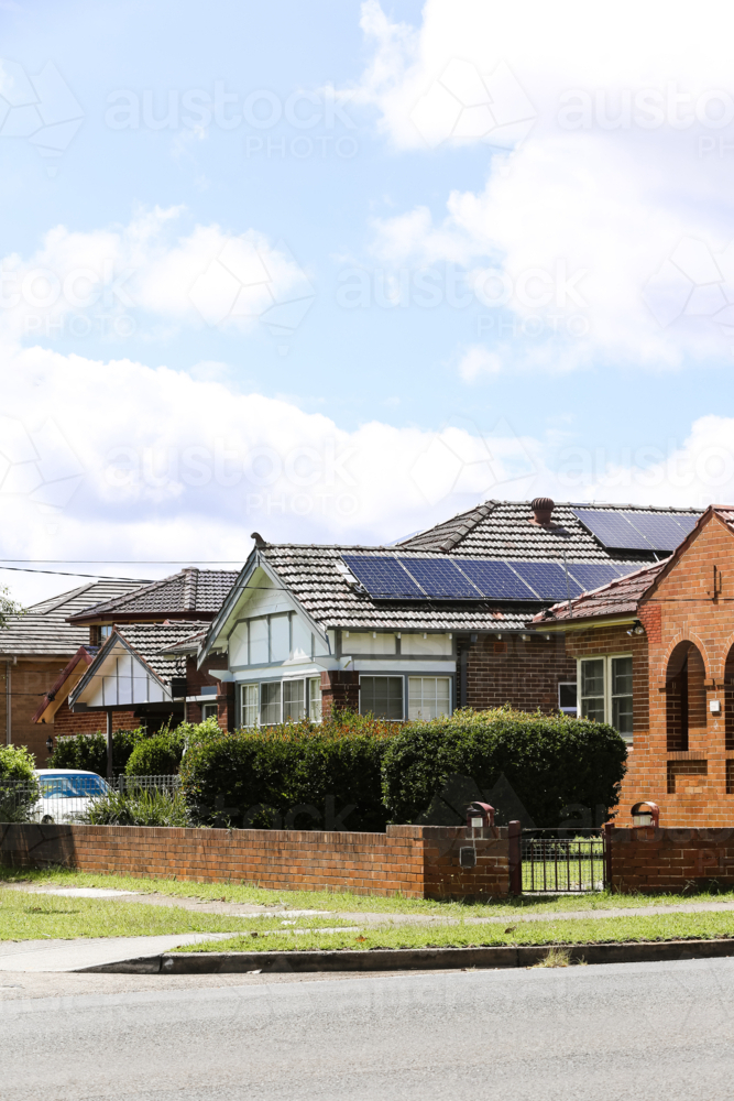 Residential house with solar panels on the roof. - Australian Stock Image