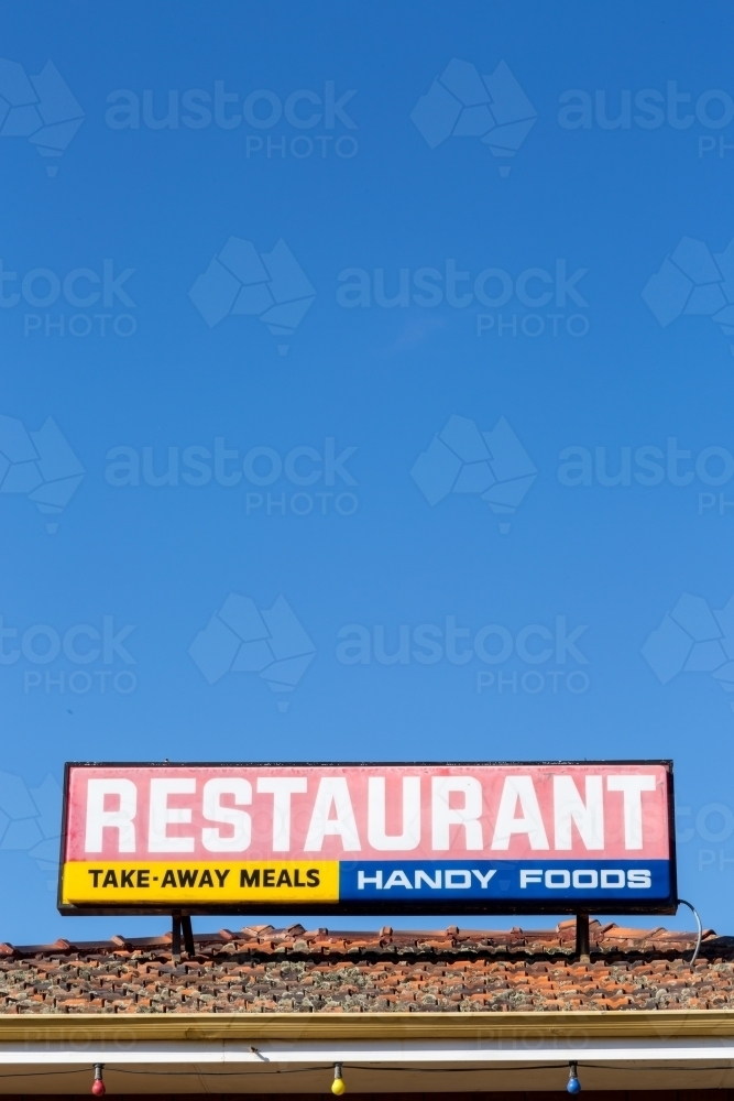 Restaurant sign on tiled roof - Australian Stock Image