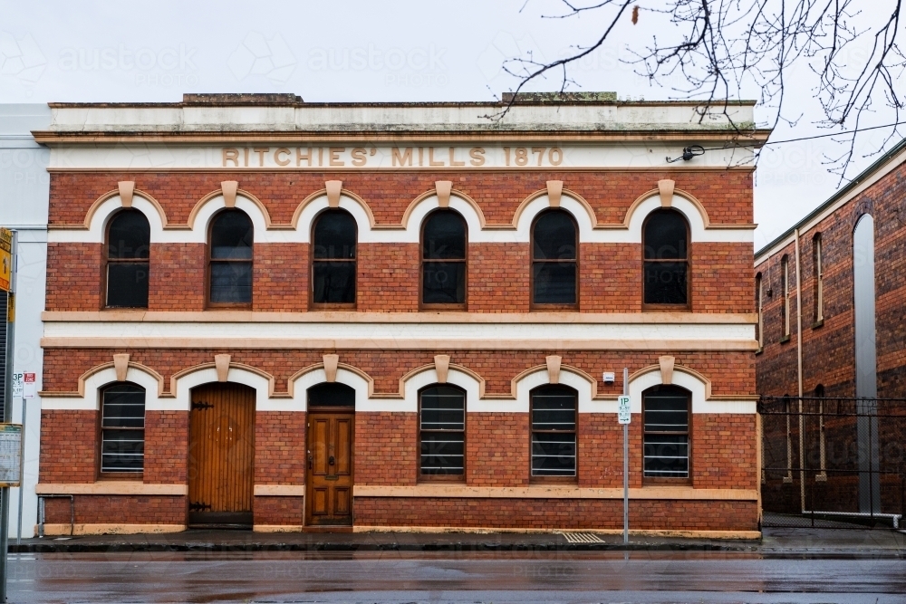 Restored old building with arched windows - Australian Stock Image