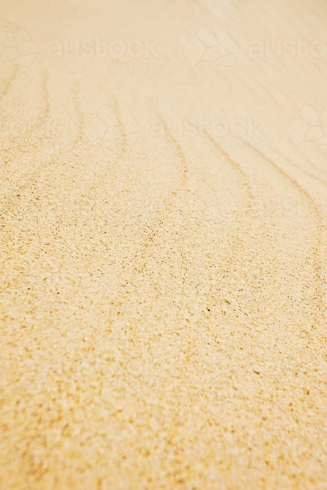 ripple pattern in sand at the beach - Australian Stock Image