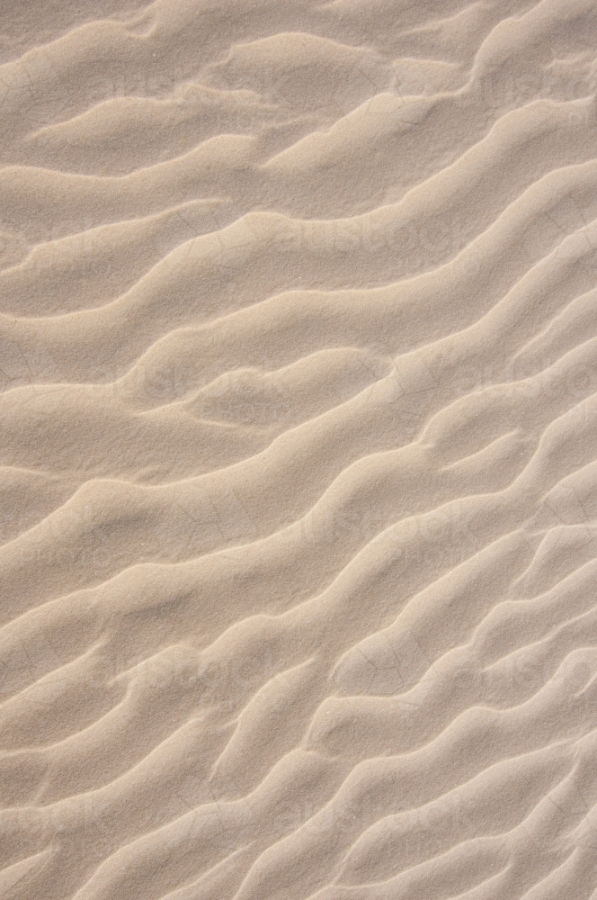 Ripples in light coloured sand - Australian Stock Image