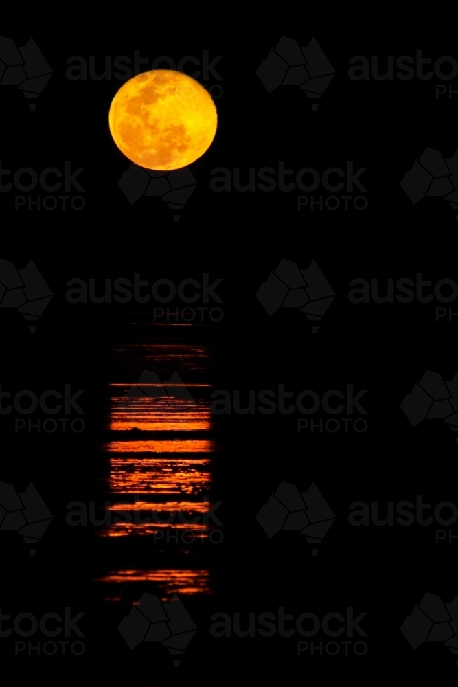 Ripples of light across water like a staircase to the moon - Australian Stock Image
