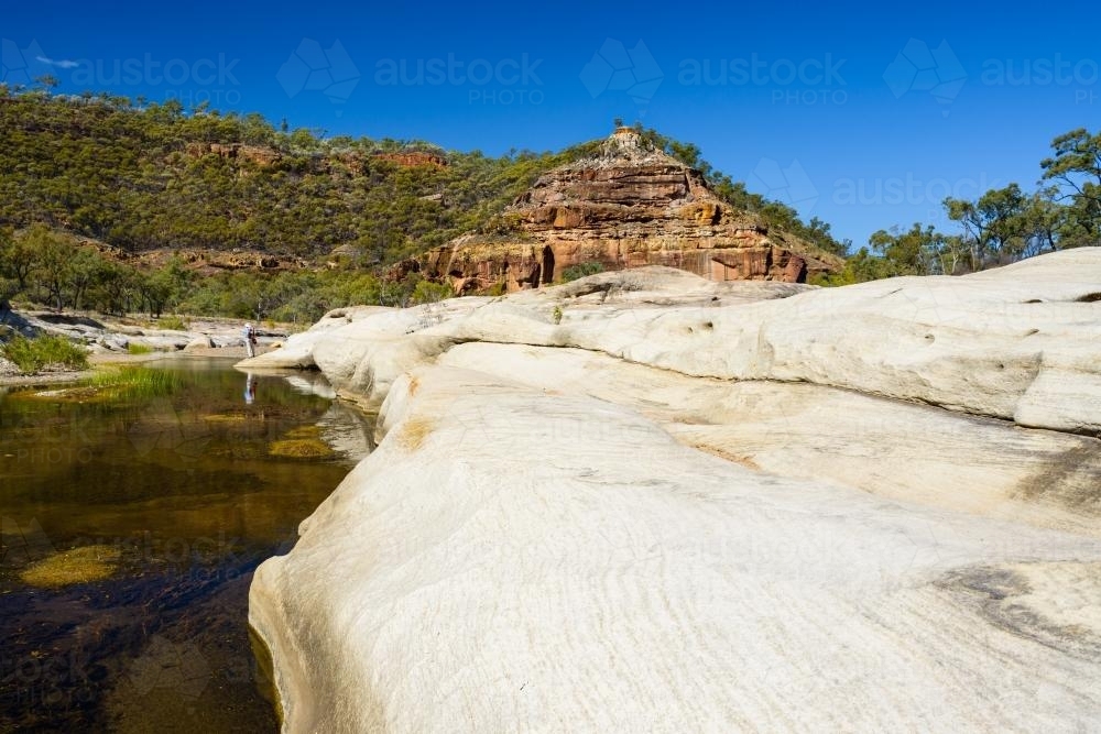 River in a gorge landscape with rock formations - Australian Stock Image