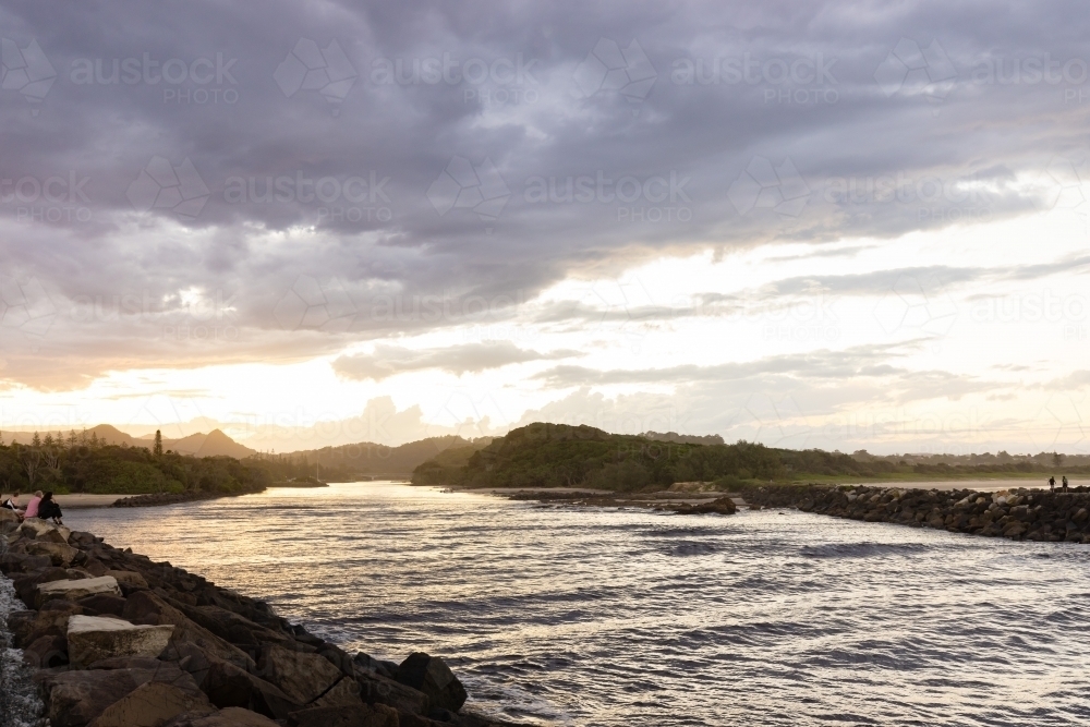 River mouth break wall where the Brunswick River meets the sea - Australian Stock Image