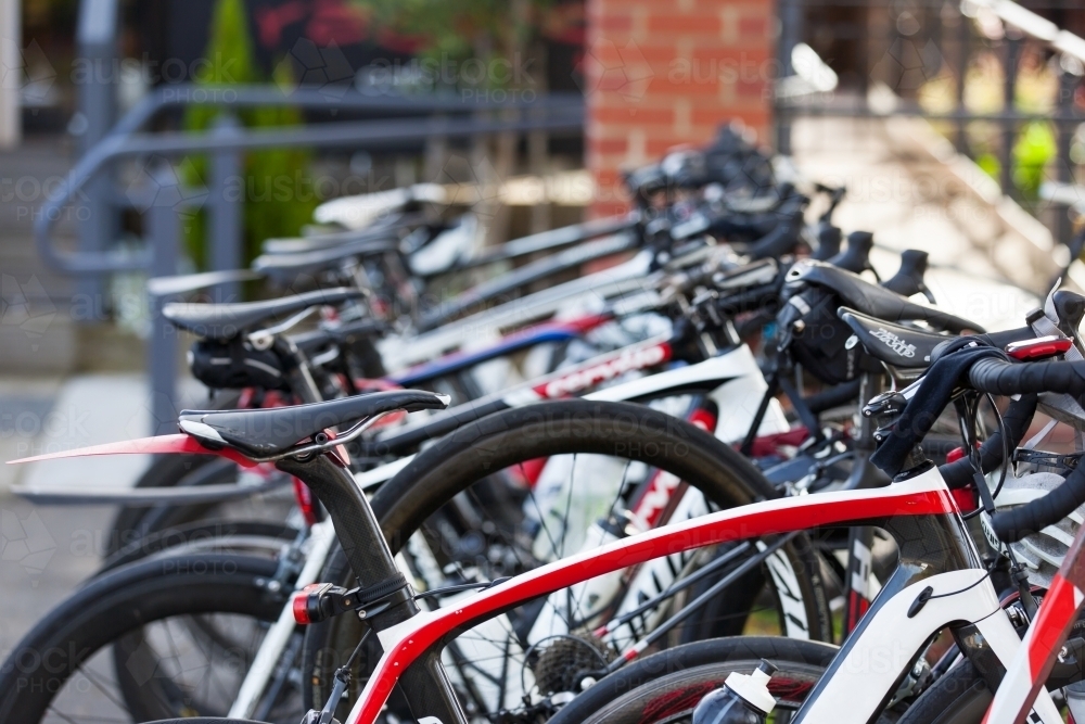 Road bikes on a rack at a cafe - Australian Stock Image