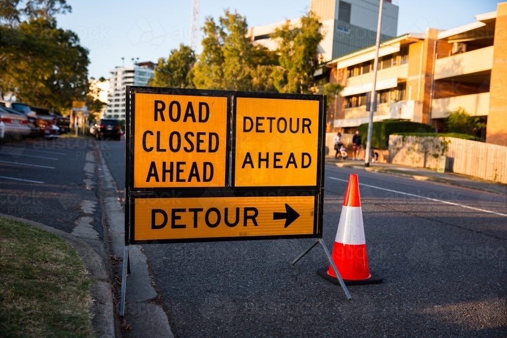 road closed and detour sign and witches hat - Australian Stock Image