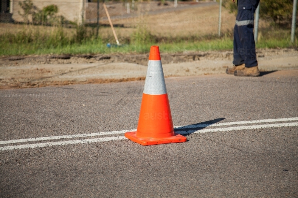 Road cones beside resurfacing roadwork - Australian Stock Image