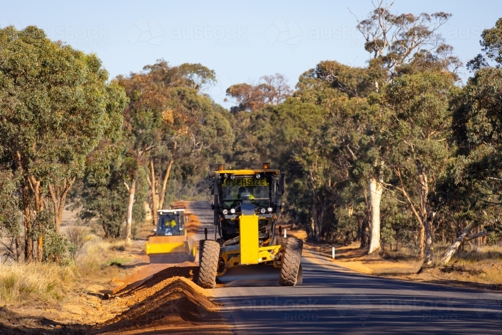 Road grader working on rural road - Australian Stock Image