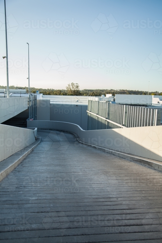 Road leading down into undercover car park - Australian Stock Image