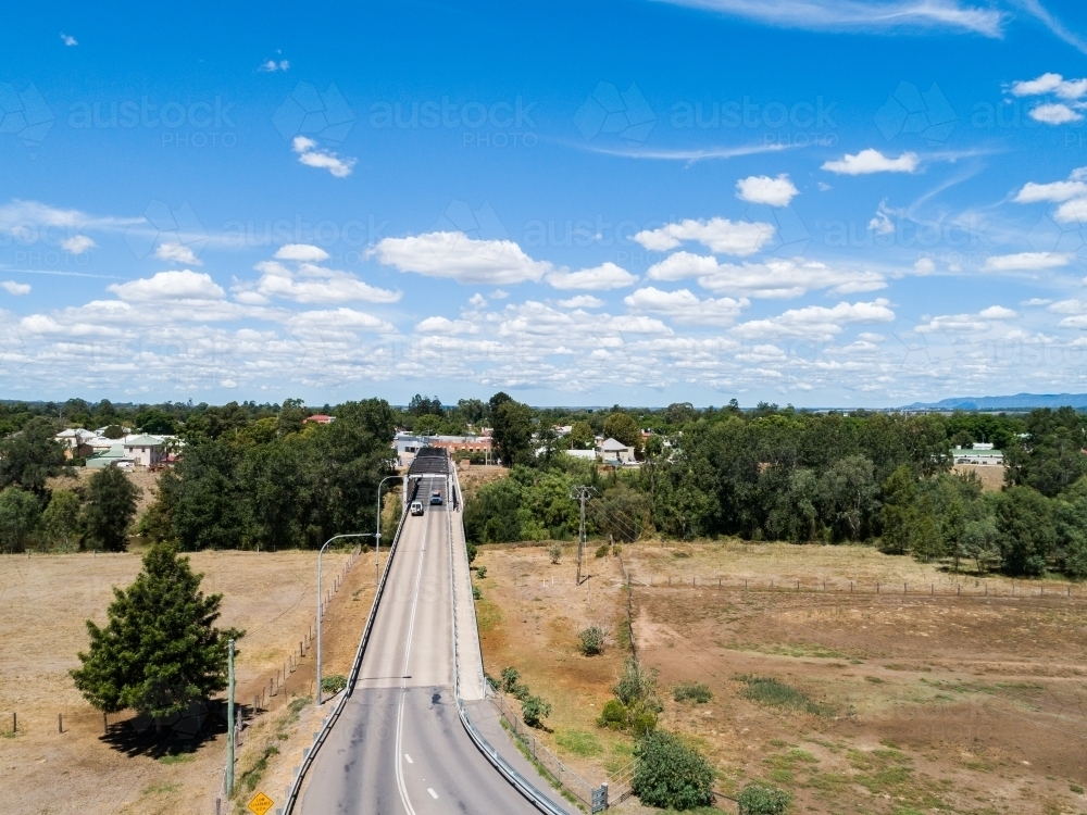 Road leading to bridge over Hunter River in Singleton - Australian Stock Image