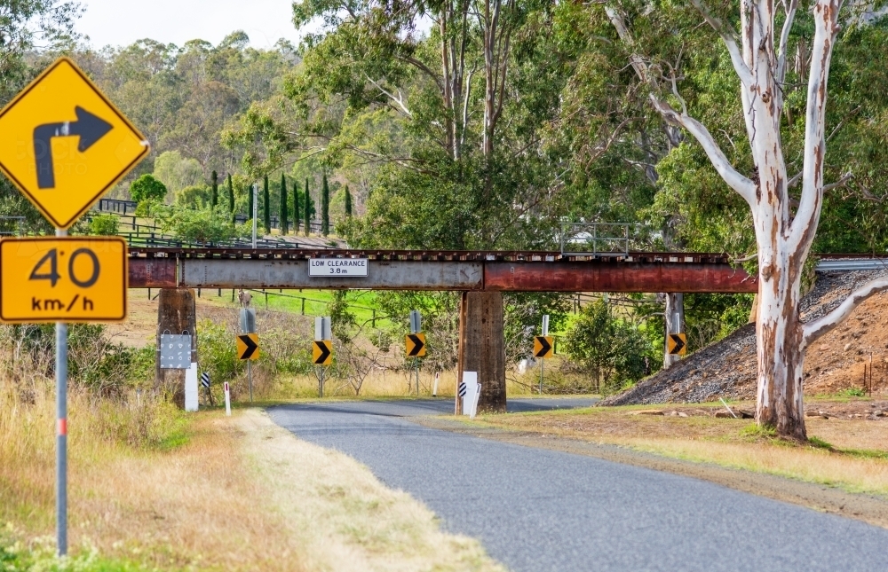 Road passing under a Railway Bridge - Australian Stock Image