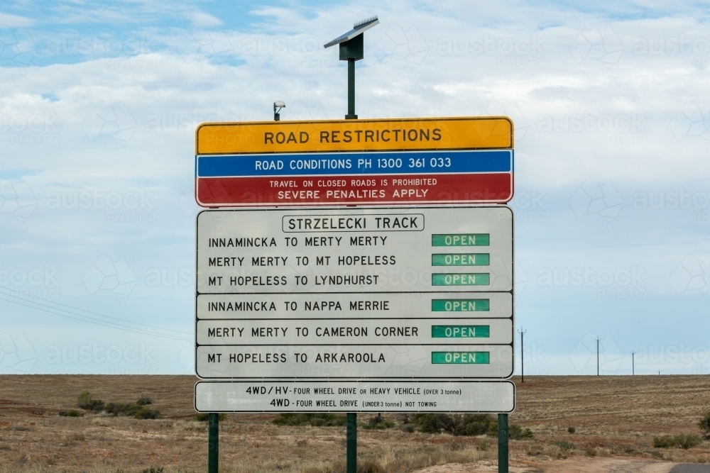 Road restrictions sign in remote setting - Australian Stock Image