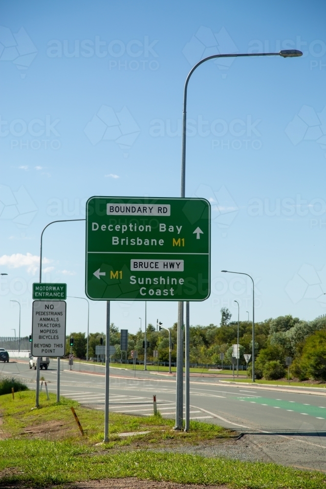 Road signs for M1 intersection for Brisbane and Sunshine Coast, Queensland. - Australian Stock Image