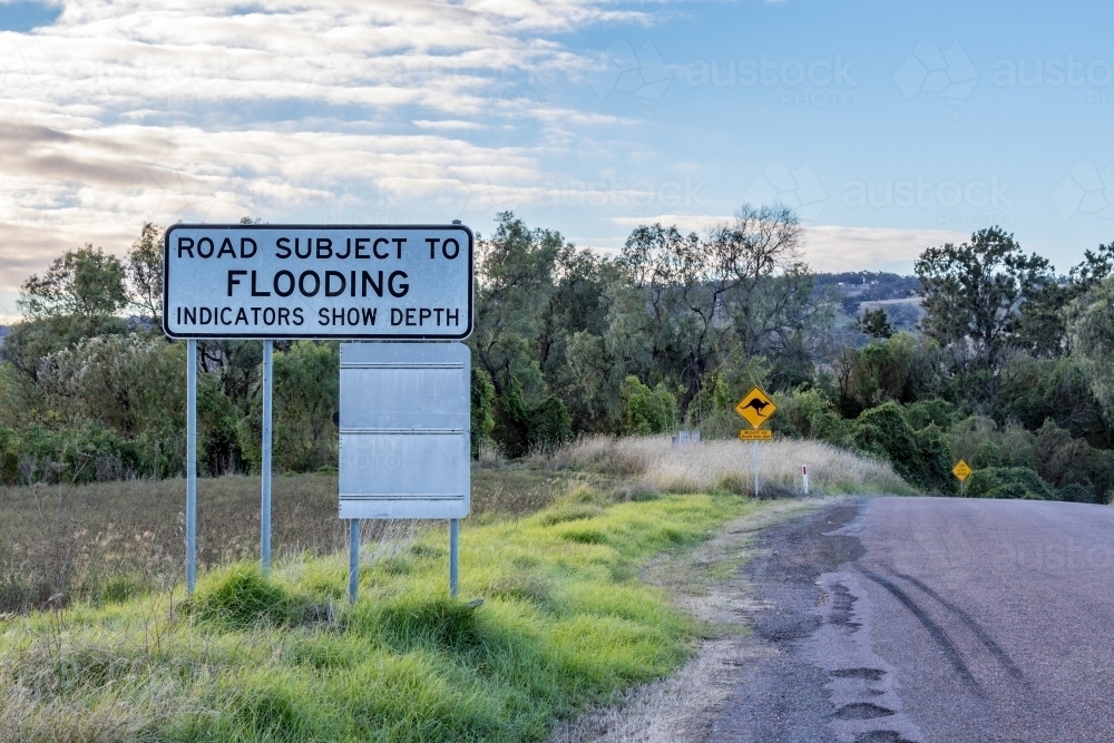 Road subject to flooding sign - Australian Stock Image