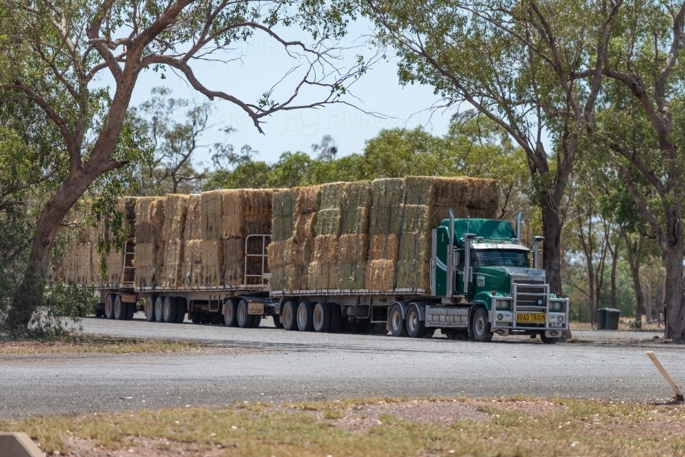 Road train with hay - Australian Stock Image