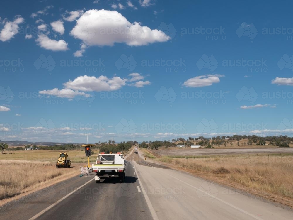 Road works with a vehicle at the stop signals - Australian Stock Image