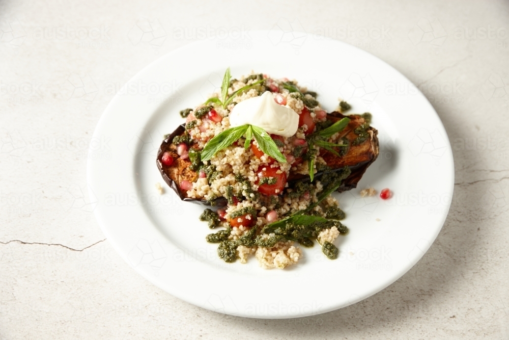 Roasted eggplant and quinoa salad - Australian Stock Image