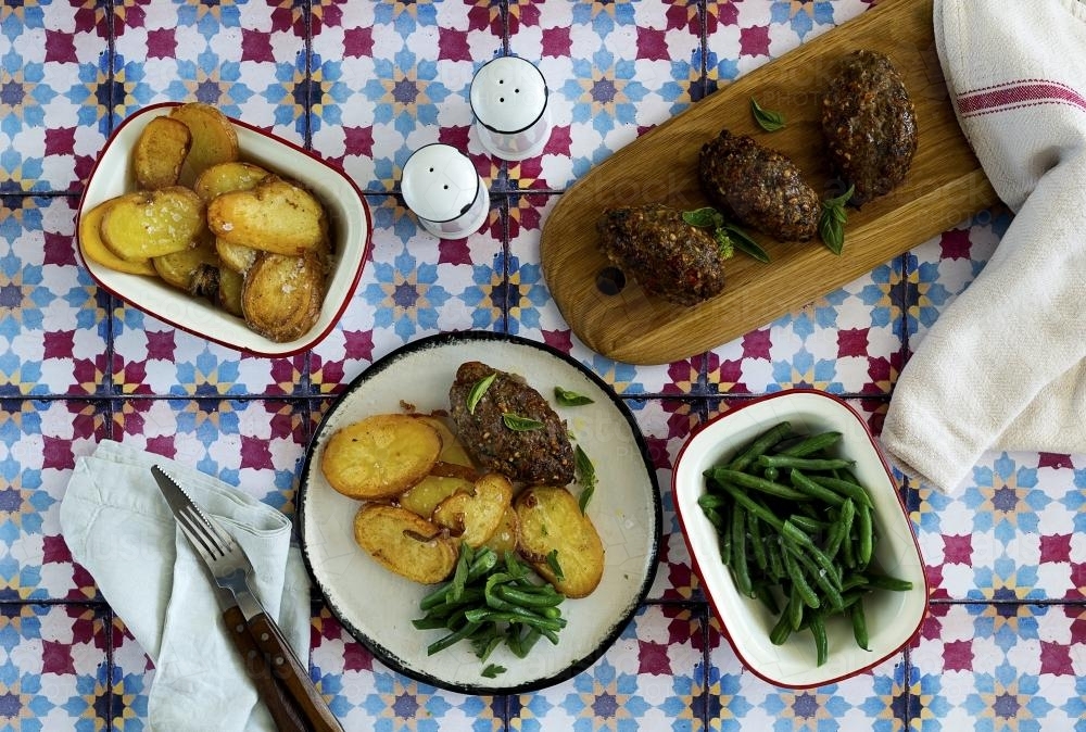 Roasted lamb and vegetable dish - Australian Stock Image