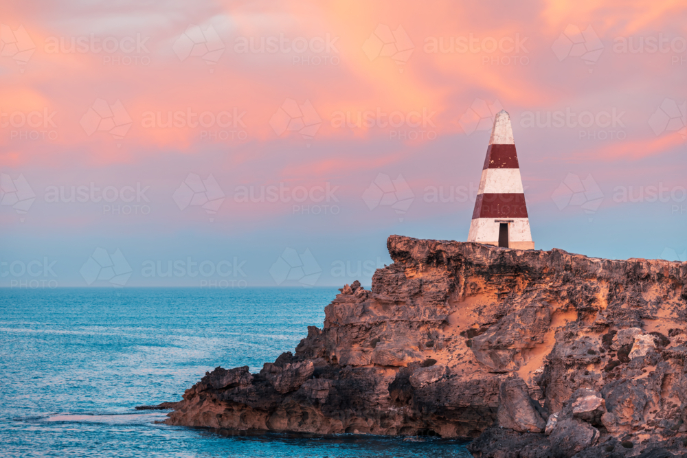 Robe Obelisk at sunrise viewed from the walking trail - Australian Stock Image
