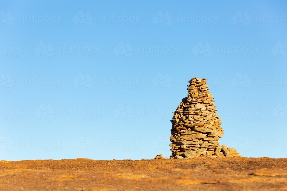 rock cairn atop granite outcrop on wheatbelt way - Australian Stock Image