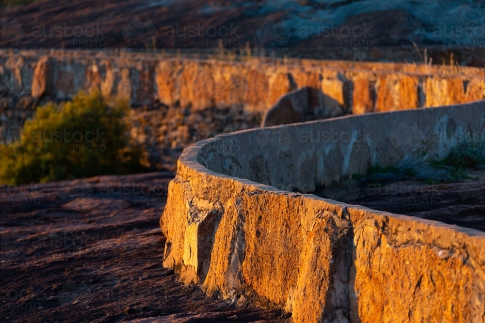 rock wall for water catchment at beringbooding rock - Australian Stock Image
